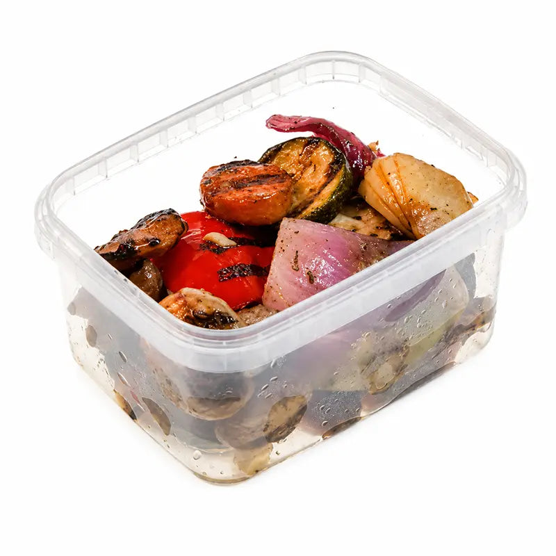 Gegrillter Antipastimix von Antipasti-Versand in Verpackung mit Champignons, Paprika, Zucchini und roten Zwiebeln